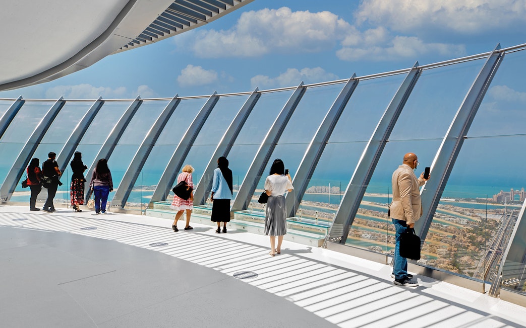 Visitors enjoying panoramic views from The View at the Palm, Dubai.