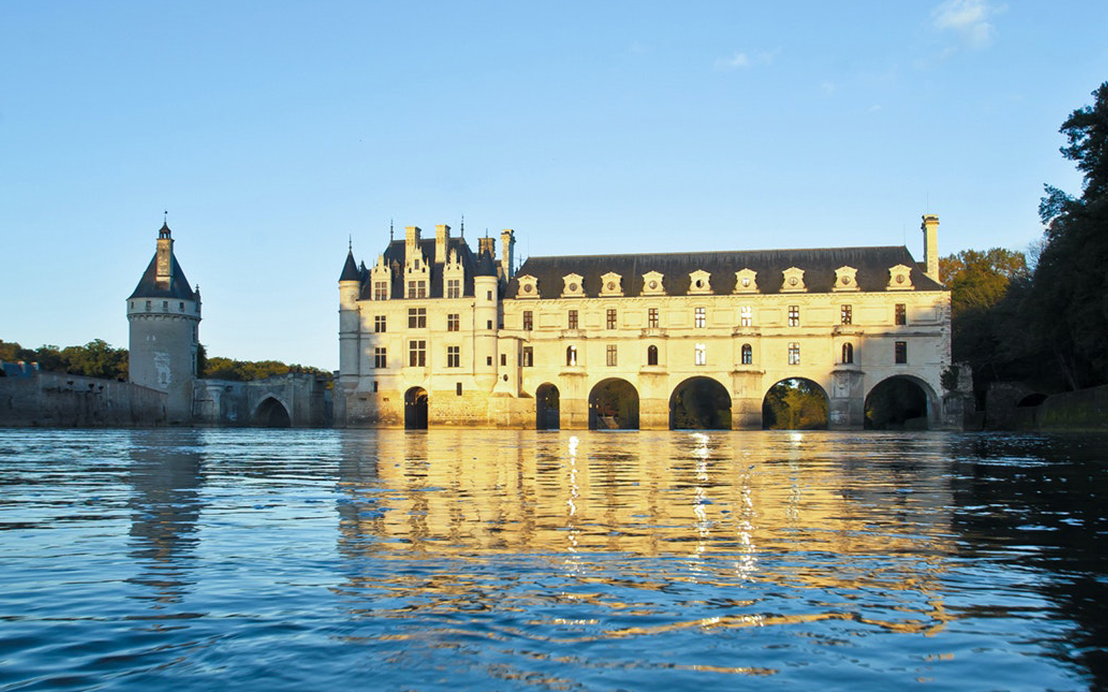 Chenonceau Castle reflecting on the Cher River, part of Chambord, Chenonceau, Azay-le-Rideau tour.