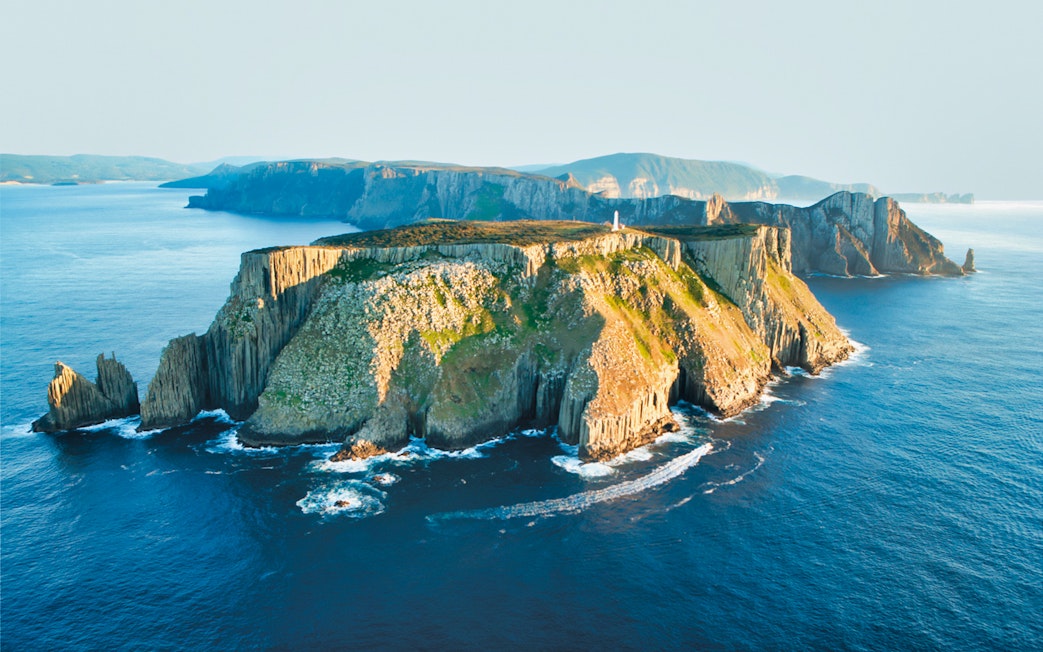 Tasman Island's rugged cliffs and ocean view on a wilderness cruise.