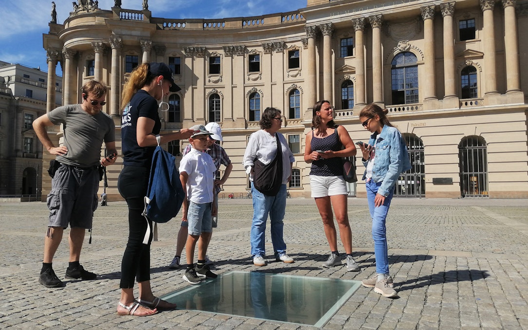 Group exploring Bebelplatz on Berlin walking tour.