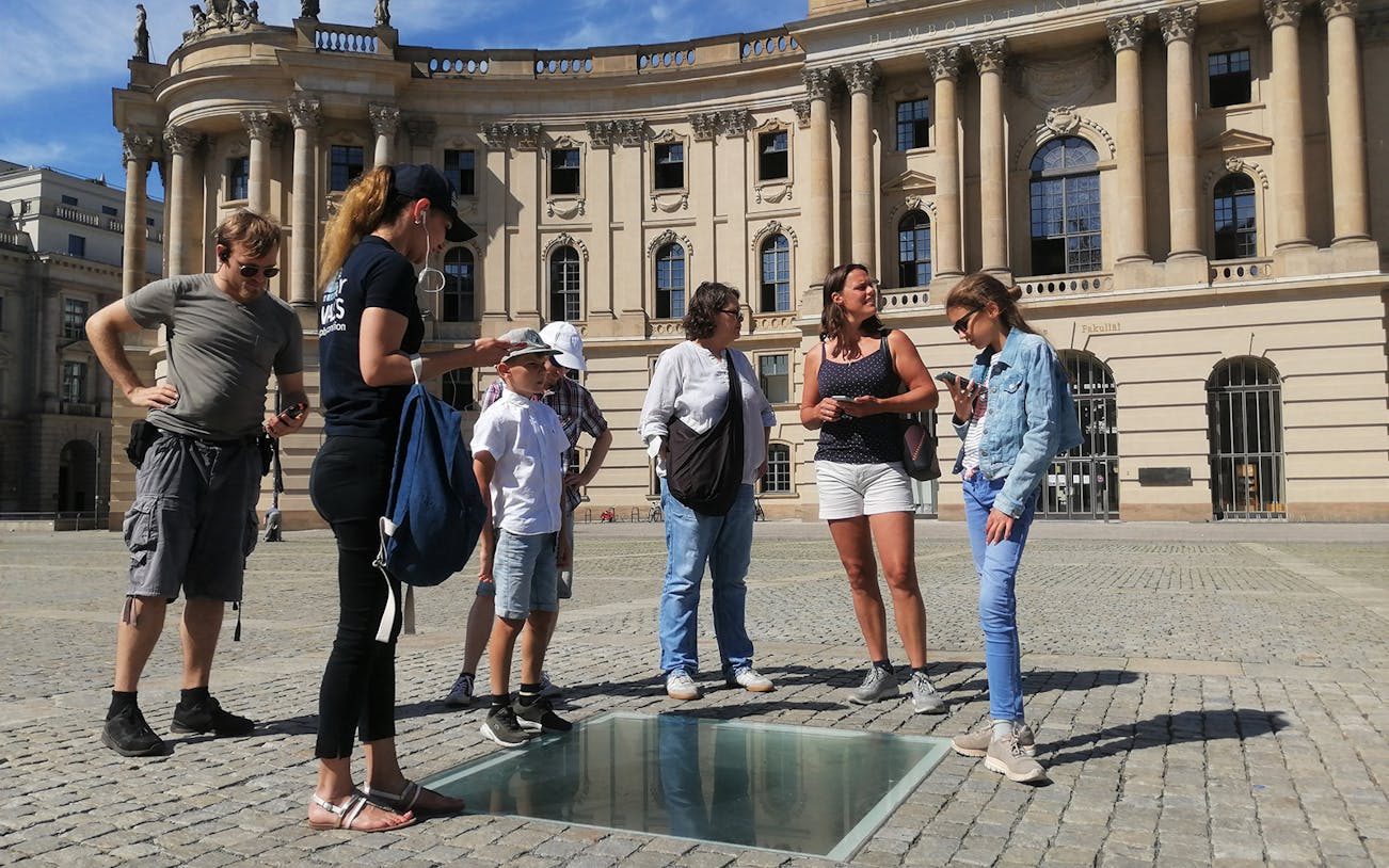 Group exploring Bebelplatz on Berlin walking tour.