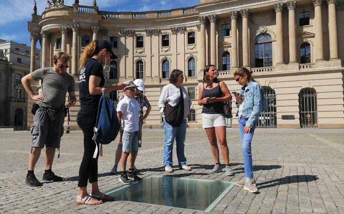 Group exploring Bebelplatz on Berlin walking tour.