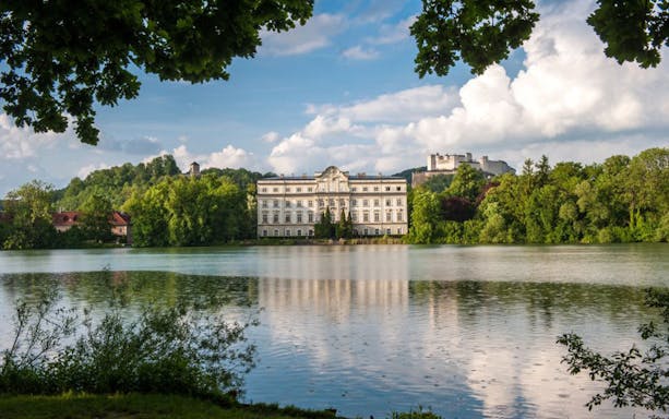 Schloss Leopoldskron by a lake in Salzburg, featured in The Sound of Music tour.