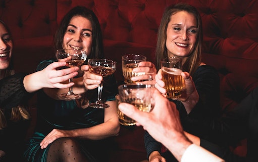 Visitors toasting drinks at Tour de BonTon.