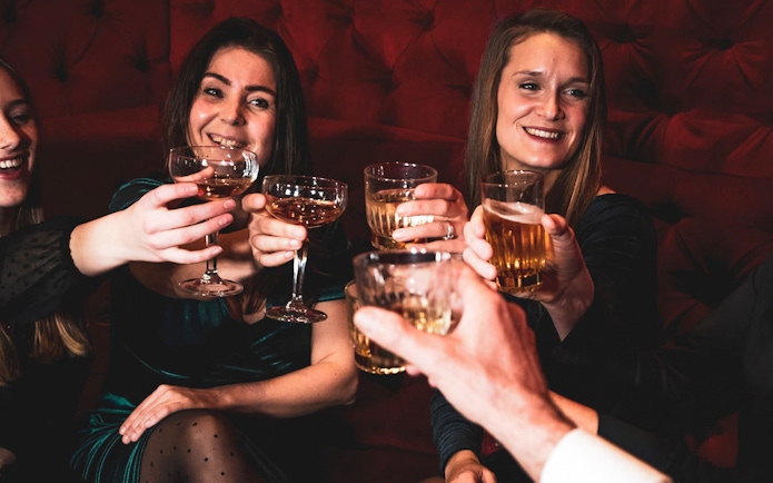 Visitors toasting drinks at Tour de BonTon.