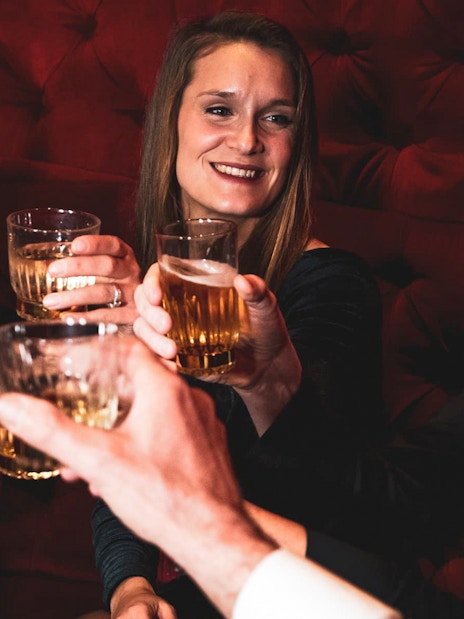 Visitors toasting drinks at Tour de BonTon.