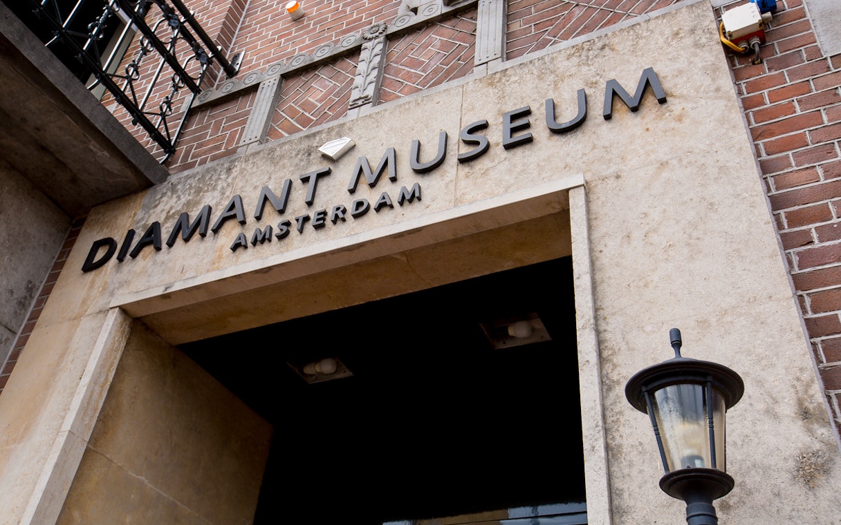 Entrance to the Diamond Museum in Amsterdam with signage above the doorway.