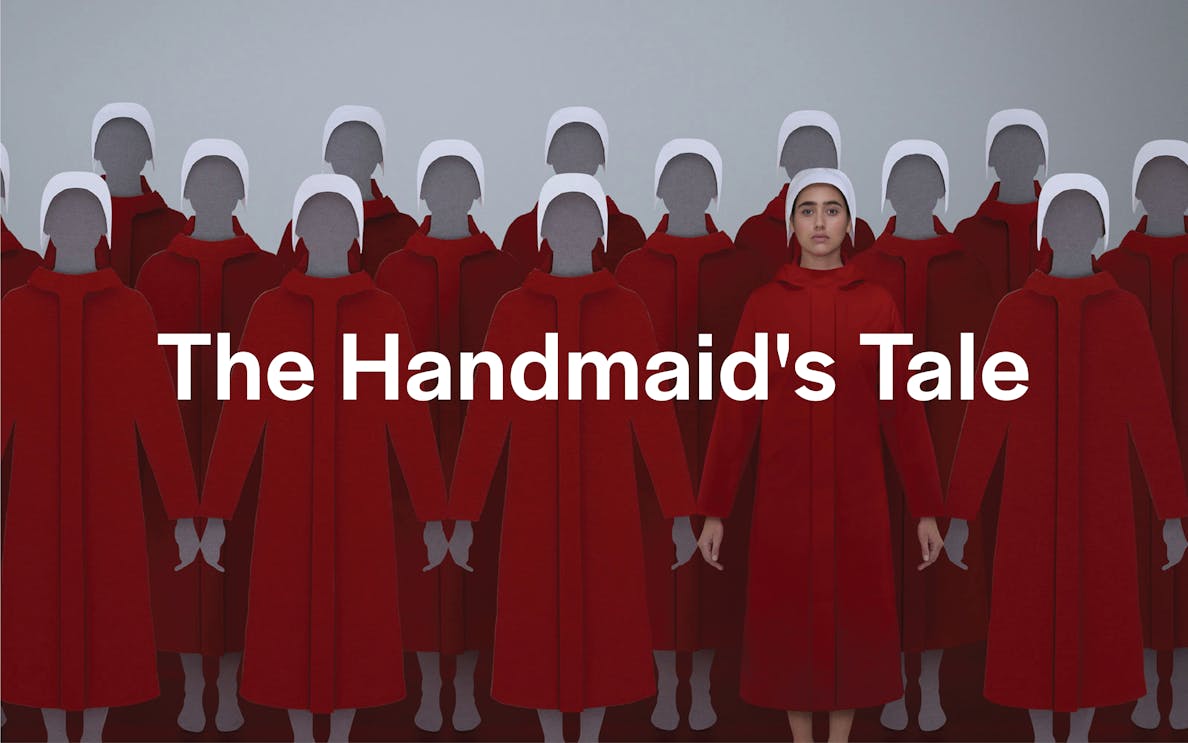 Theater stage with actors performing The Handmaid's Tale in London.