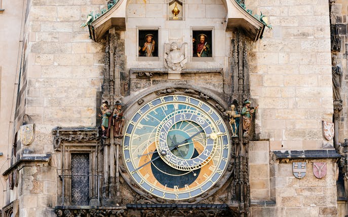 Astronomical Clock in Prague, featuring intricate details and figures, on a day trip from Vienna.