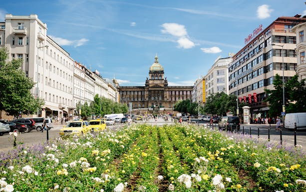 Wenceslas Square with National Museum in Prague on a sunny day.