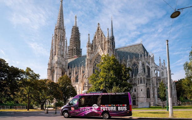 Future Bus in front of Votivkirche, Vienna, offering virtual reality city tour.