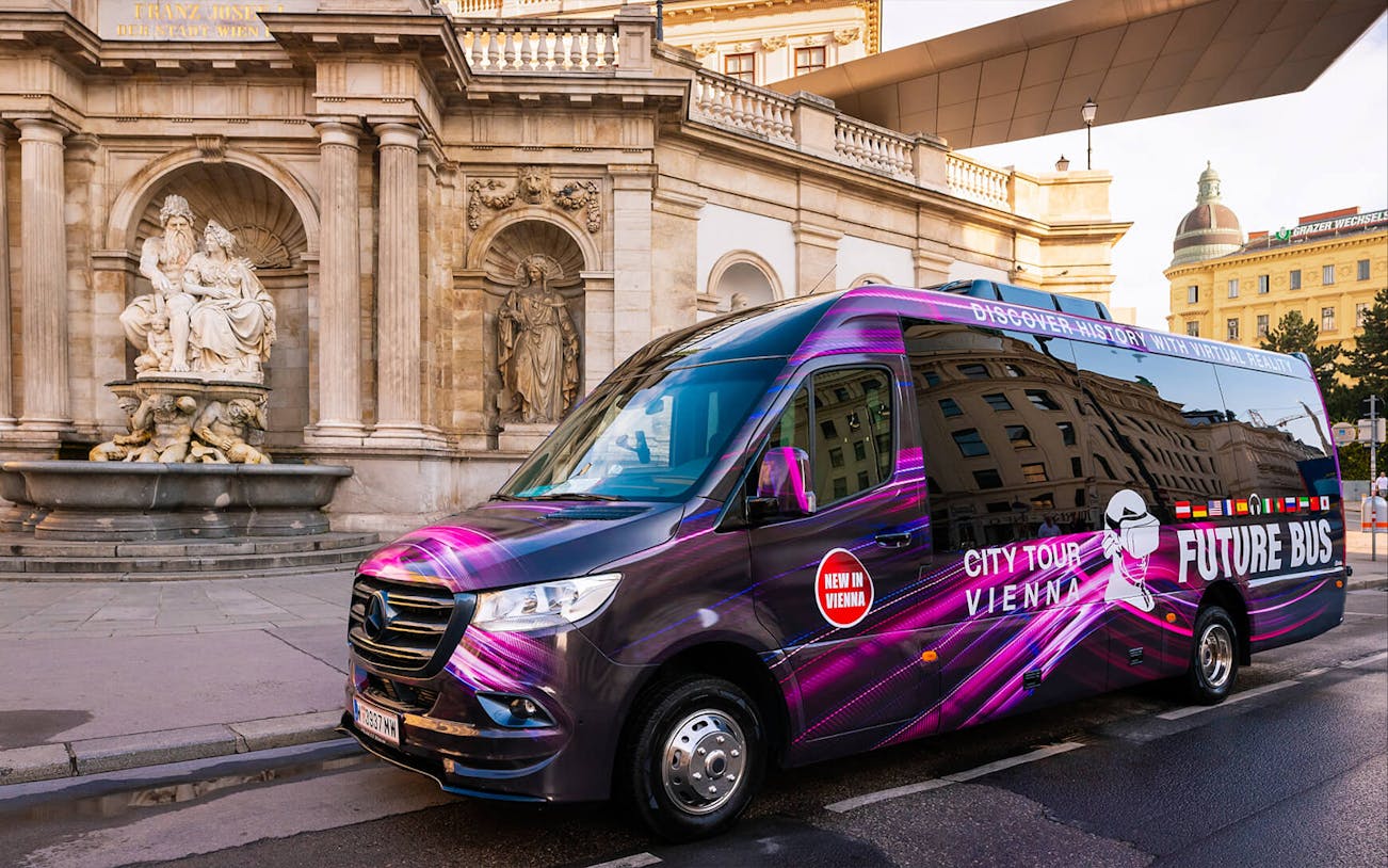 Future Bus parked in front of a historic Vienna building, offering virtual reality city tours.