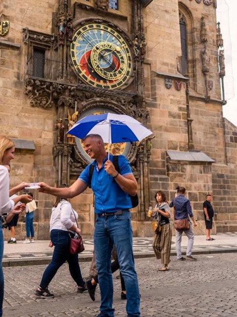 Tourists gather near the Astronomical Clock Tower in Prague.