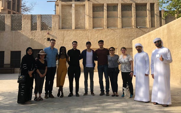 Group of tourists at Al Fahidi Historical Neighborhood, Dubai Unlimited Attractions Pass.