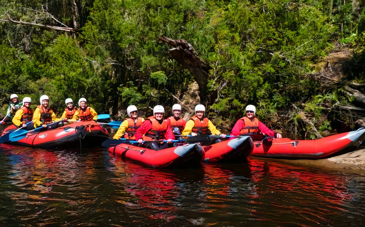 Kayakers paddling on Hobart's Twin Rivers during a 4km adventure tour.