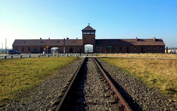 Railway tracks leading to Auschwitz-Birkenau entrance, Poland.