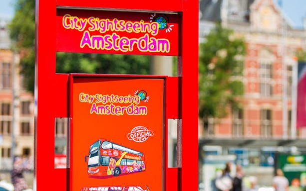 City Sightseeing Amsterdam sign for hop-on hop-off bus tour.