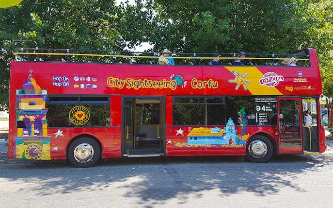 Red double-decker bus for City Sightseeing Corfu on the Kanoni route.