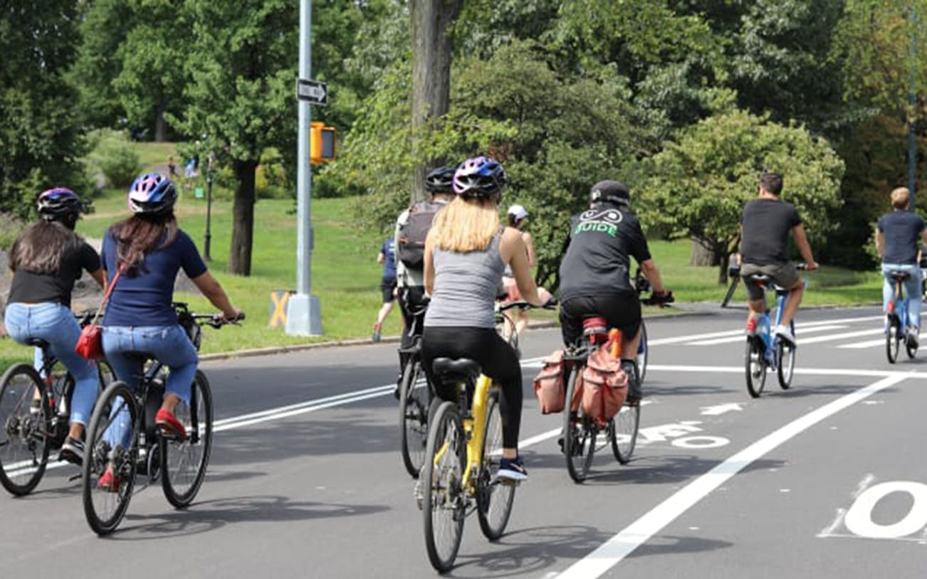 Cyclists on a guided tour through Central Park, New York City.