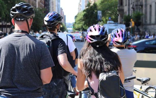 Cyclists on a New York City street during a highlights bike tour.