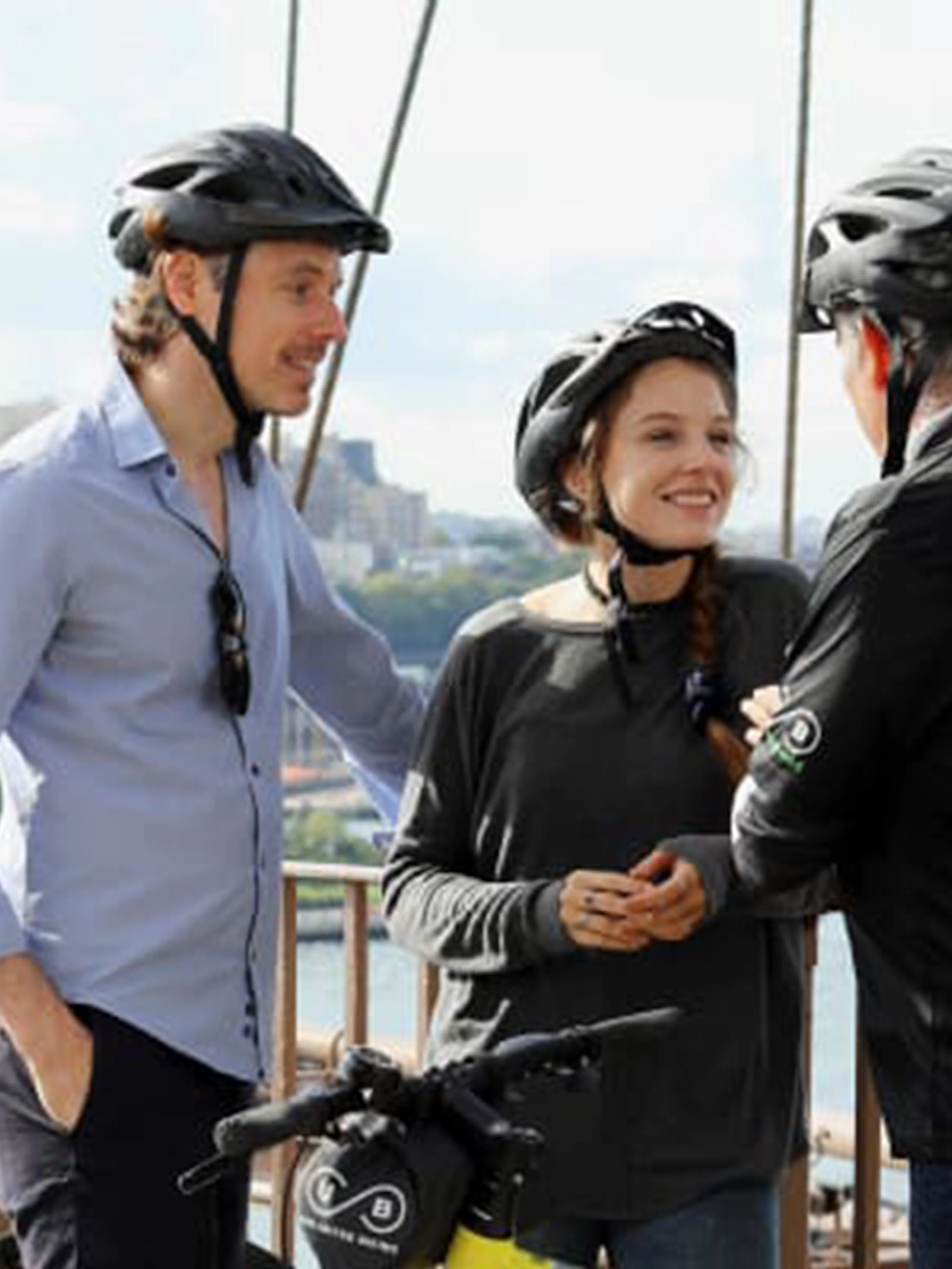 Cyclists with guide on Brooklyn Bridge during New York Highlights Bike Tour.
