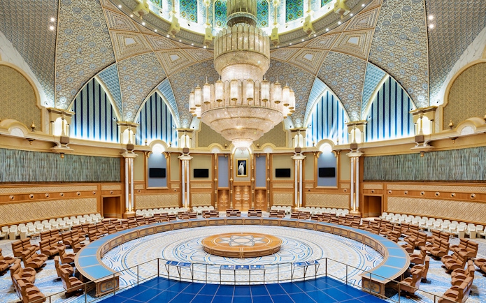Qasr Al Watan's grand hall with intricate ceiling and large chandelier, Abu Dhabi.