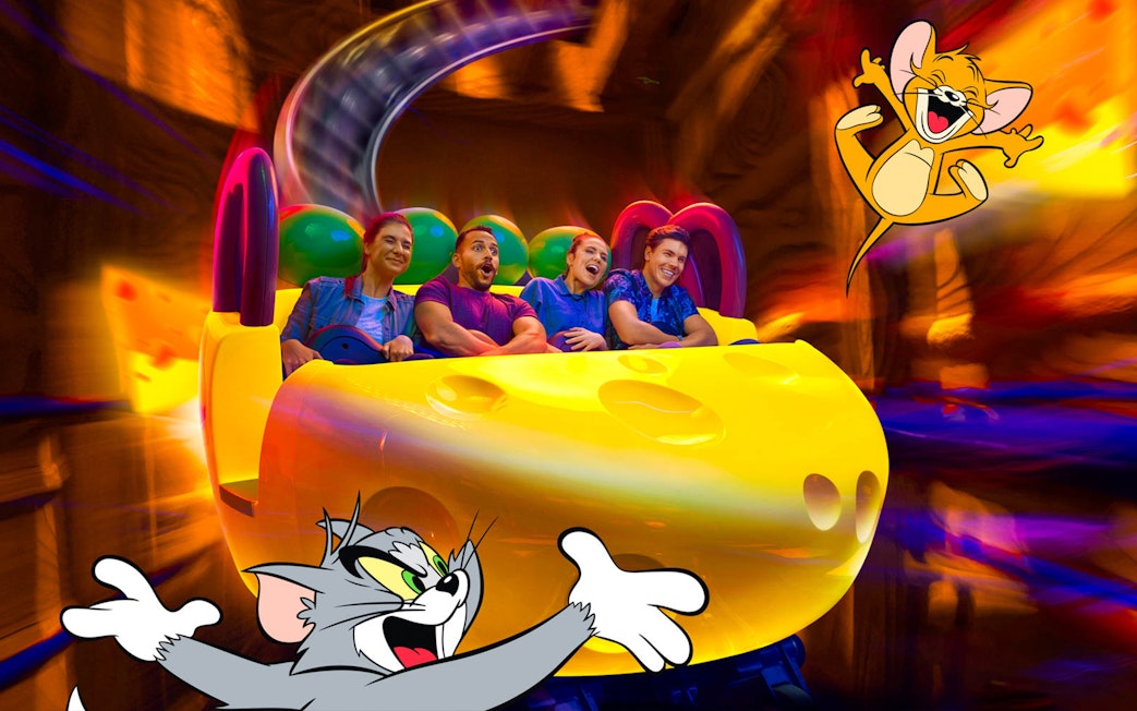 Visitors enjoying a Tom and Jerry themed ride at Warner Bros. World Abu Dhabi.