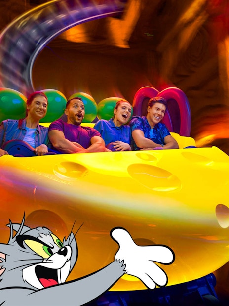 Visitors enjoying a Tom and Jerry themed ride at Warner Bros. World Abu Dhabi.