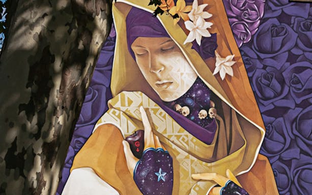 Colorful mural of a hooded figure with flowers and cosmic elements, featured on the Murals XXL Street Art Tour.