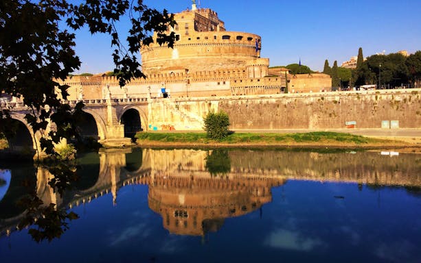 Castel Sant'Angelo and its reflection in the Tiber River, Rome.