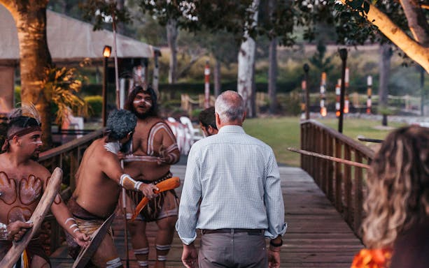 Indigenous performers greet guests at Spirits of the Red Sand Evening Theatre Show in Australia.
