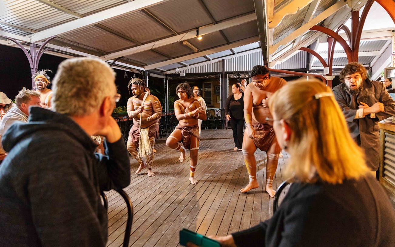 Performers in traditional attire at Spirits of the Red Sand Evening Theatre Show, Australia.