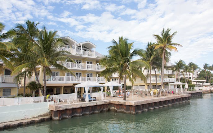 Seaside resort with palm trees on Miami to Key West sightseeing tour.