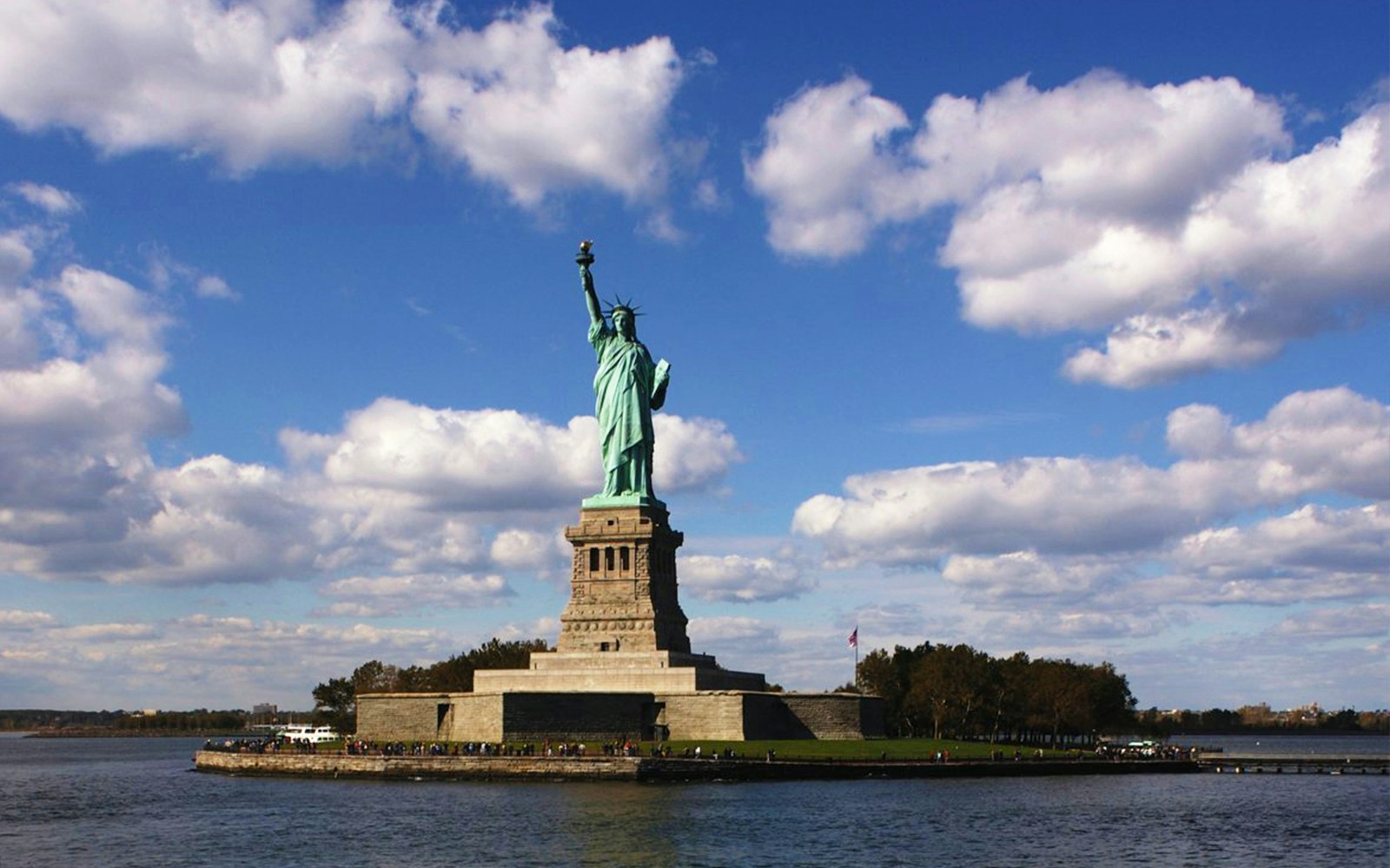 Visitors exploring the 911 Memorial Museum and preparing for the Lady Liberty Cruise in NYC