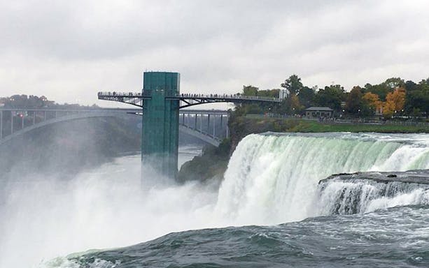 Observation deck overlooking Niagara Falls on a cloudy day, USA.