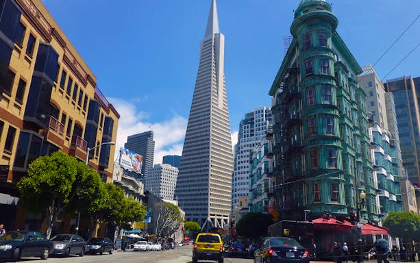 Transamerica Pyramid and Columbus Tower in San Francisco street view.