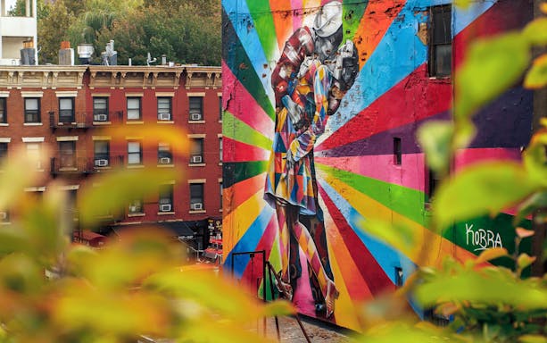 Colorful mural on a building near the High Line in New York City.