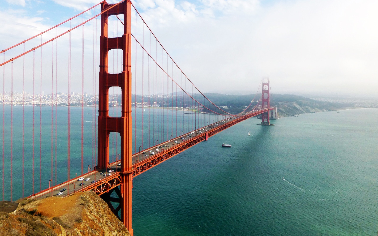 Golden Gate Bridge view from a boat on Half Day Tour to Muir Woods & Sausalito, San Francisco.