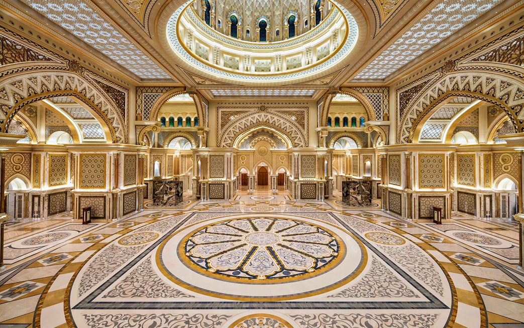Ornate interior of Qasr Al Watan in Abu Dhabi, showcasing intricate patterns and grand architecture.