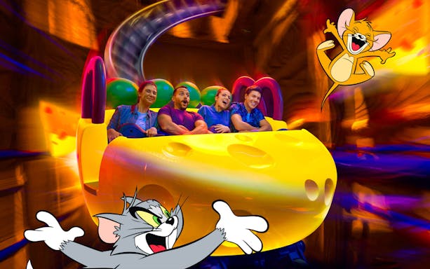 Visitors enjoying a Tom and Jerry themed ride at Warner Bros. World™ Abu Dhabi.