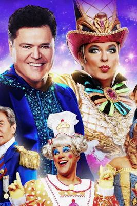 Colorful cast of performers in vibrant costumes for Pantoland show.