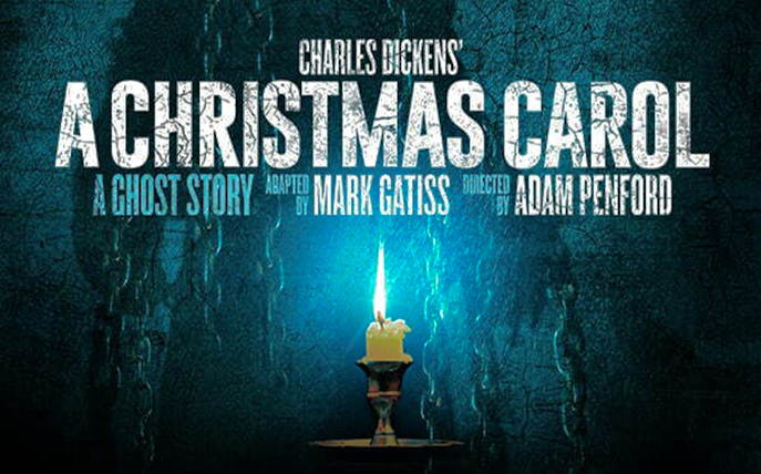 A Christmas Carol poster with candle and chains, adapted by Mark Gatiss.