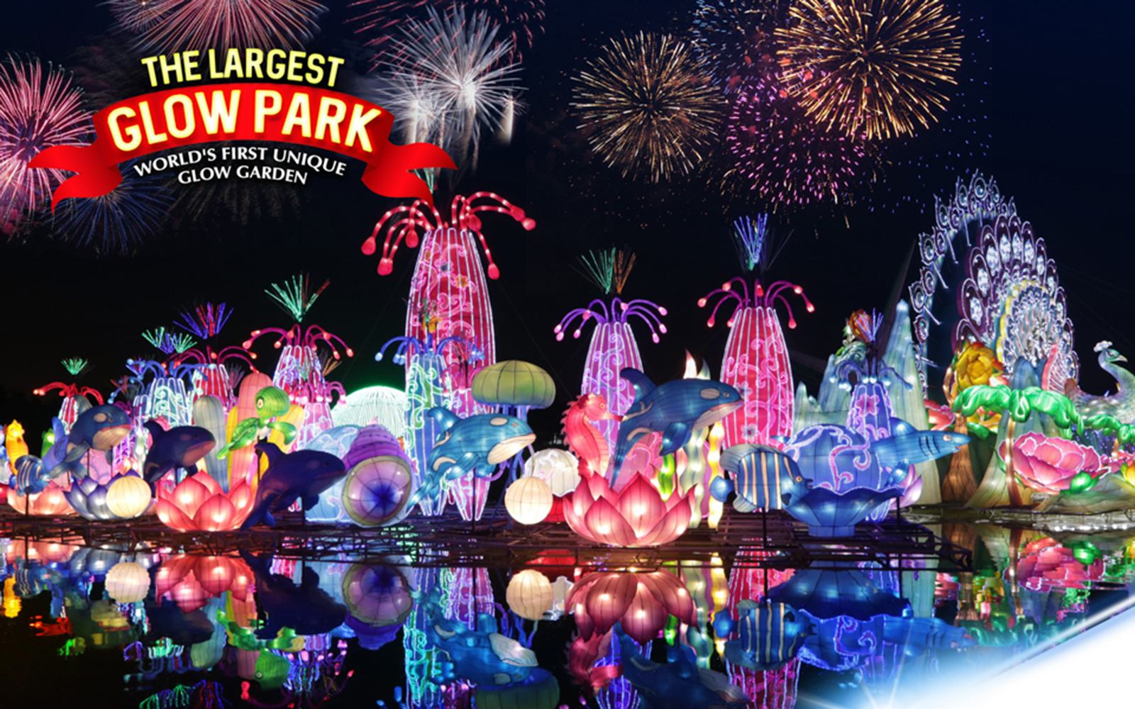 Dubai Garden Glow illuminated sculptures and fireworks at night.