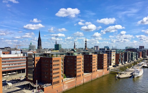 Speicherstadt and HafenCity with Elbphilharmonie in Hamburg, Germany, viewed from above.