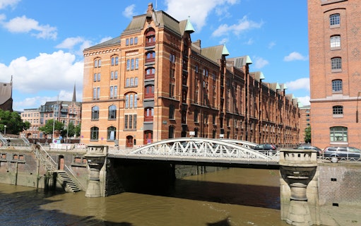 Speicherstadt brick warehouse district with canal and bridge in Hamburg, Germany.