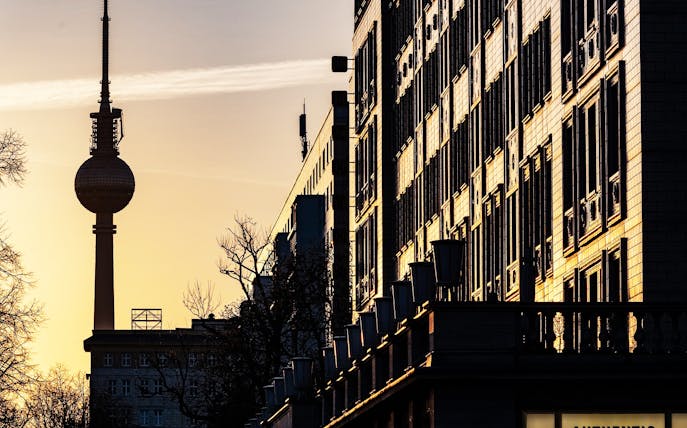 TV Tower and city buildings at sunset in Berlin, Germany.