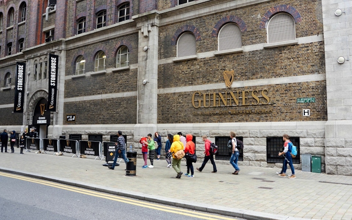 Guinness Storehouse entrance with visitors, Dublin Self Guided Audio Tour.