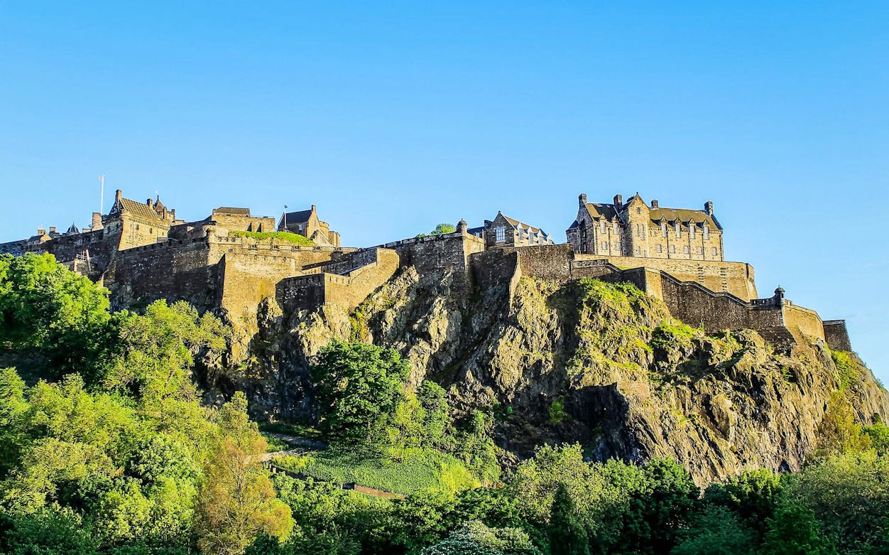 Edinburgh street view with historic buildings on a self-guided audio tour.