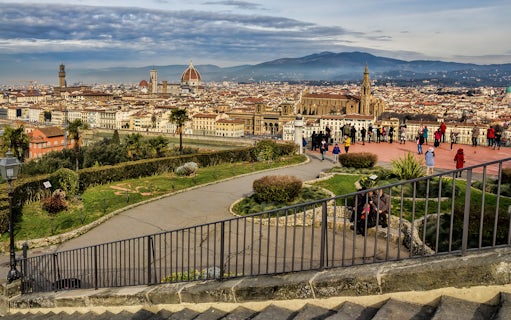 Florence cityscape view from Piazzale Michelangelo with tourists exploring.