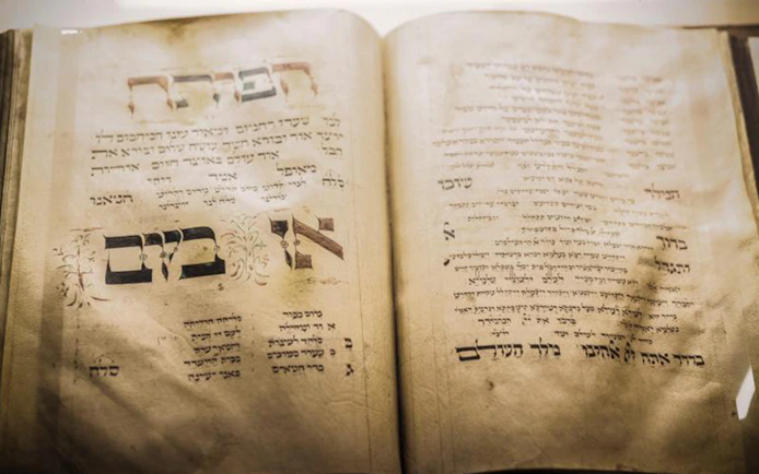 Ancient Hebrew text in a book from the Prague Jewish Quarter tour.